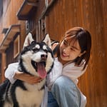 medium-shot-asian-woman-with-cute-dog