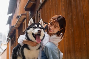 medium-shot-asian-woman-with-cute-dog